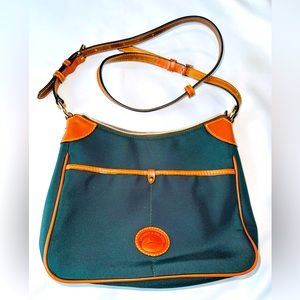 Authentic Dooney & Bourke dark green nylon crossbody bag.